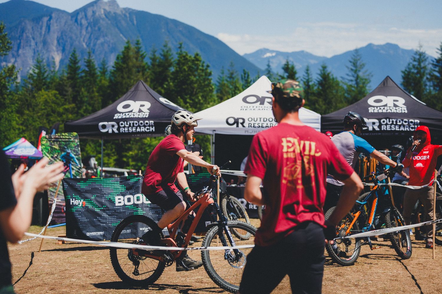 Mountain bike event with riders and spectators at Outdoor Research sponsored outdoor festival.