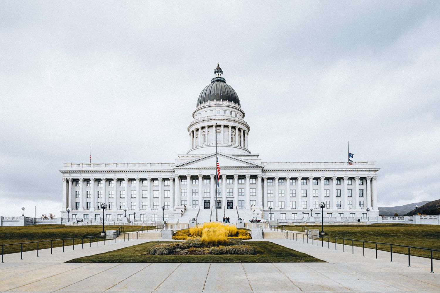 Utah State Capitol Building with neoclassical dome under overcast sky, Salt Lake City.