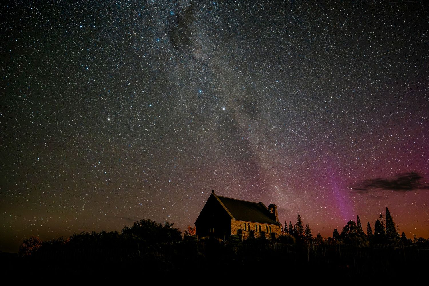 Milky Way and aurora australis over Church of the Good Shepherd, Lake Tekapo.