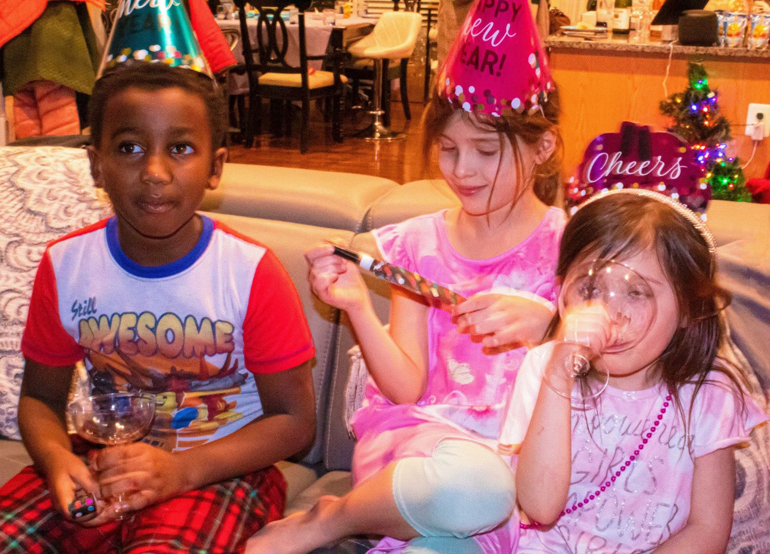 Children enjoying party activities with colorful decorations and party supplies.