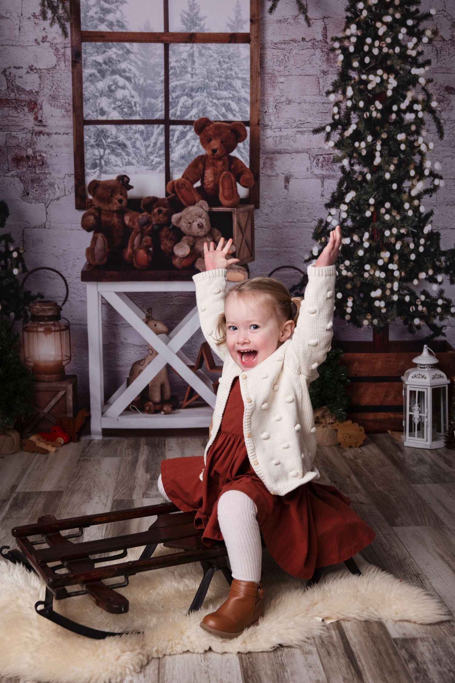 Festive holiday photo series with Christmas tree, rustic decor, and joyful expressions against wooden floor backdrop.