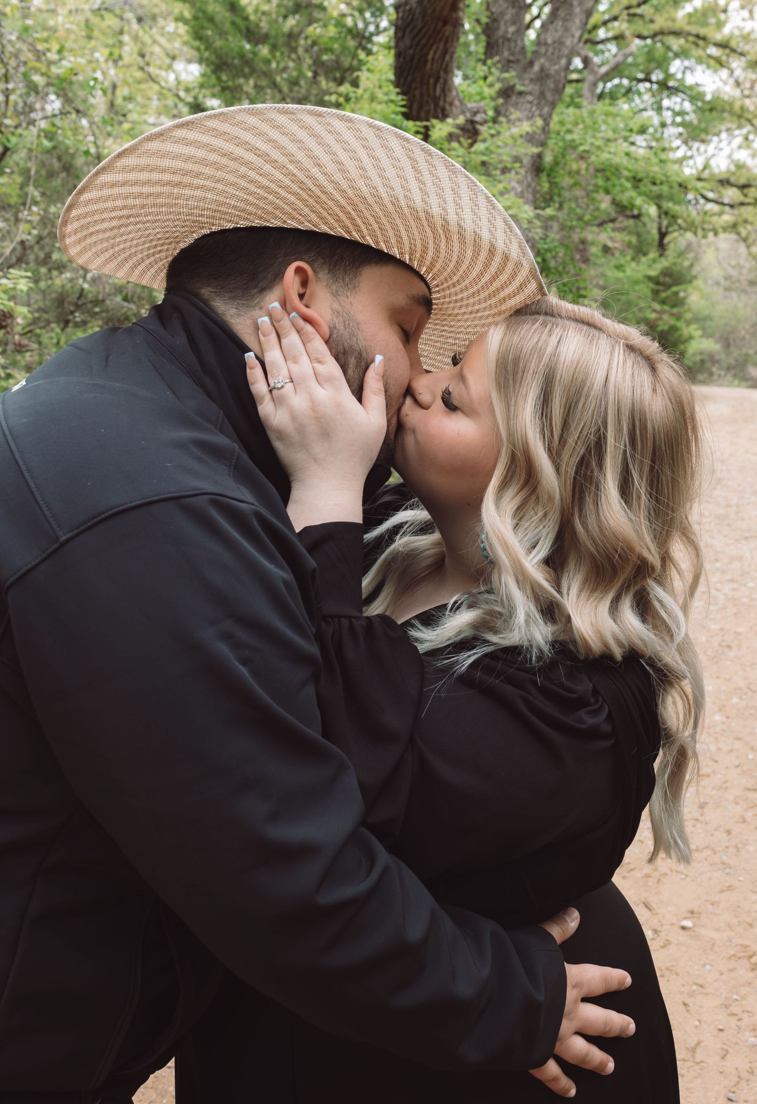 A series of romantic photos showing a couple sharing tender moments outdoors while one wears a sun hat.