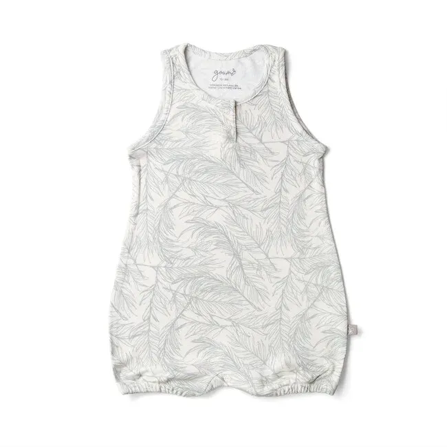 White sleeveless baby romper with delicate gray leaf print pattern, featuring snap closure and elastic hem.