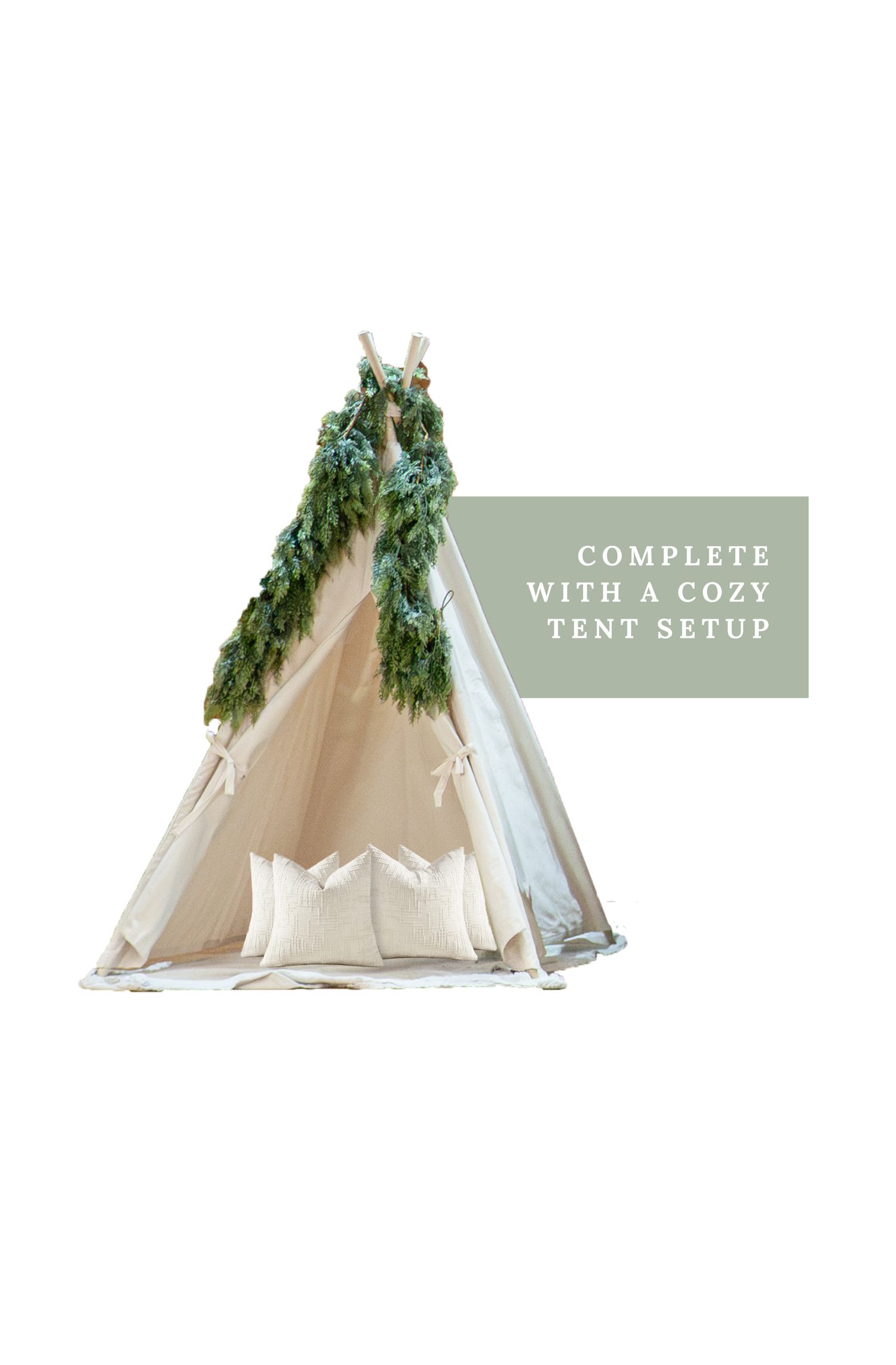 A cozy canvas teepee tent adorned with lush green garland and white pillows for a charming boho setup.