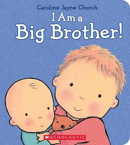 I Am a Big Brother board book by Caroline Jayne Church, showing a toddler boy holding a newborn baby, published by Scholastic.