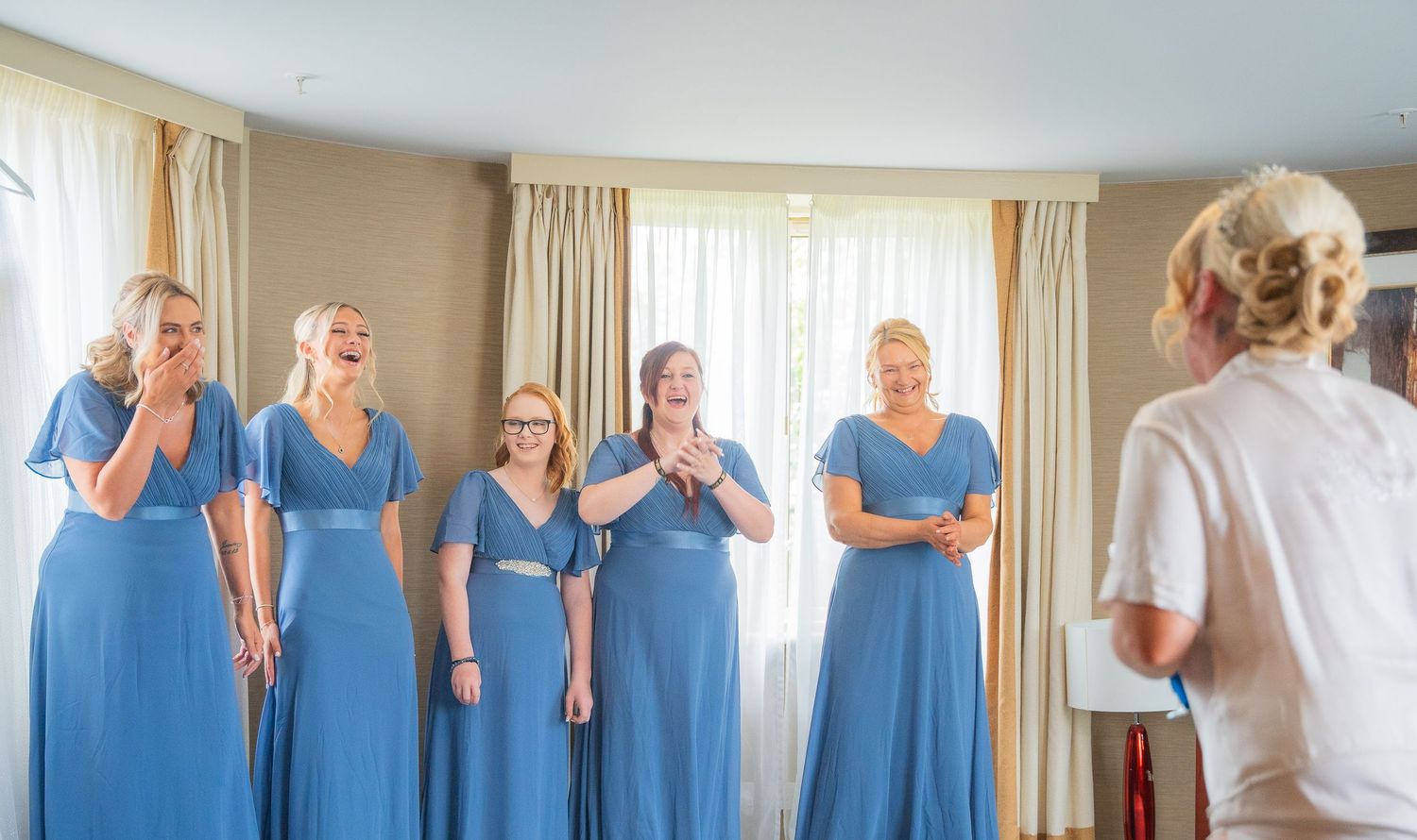 Candid bridal prep moments with soft light and emotion, captured naturally before the ceremony.