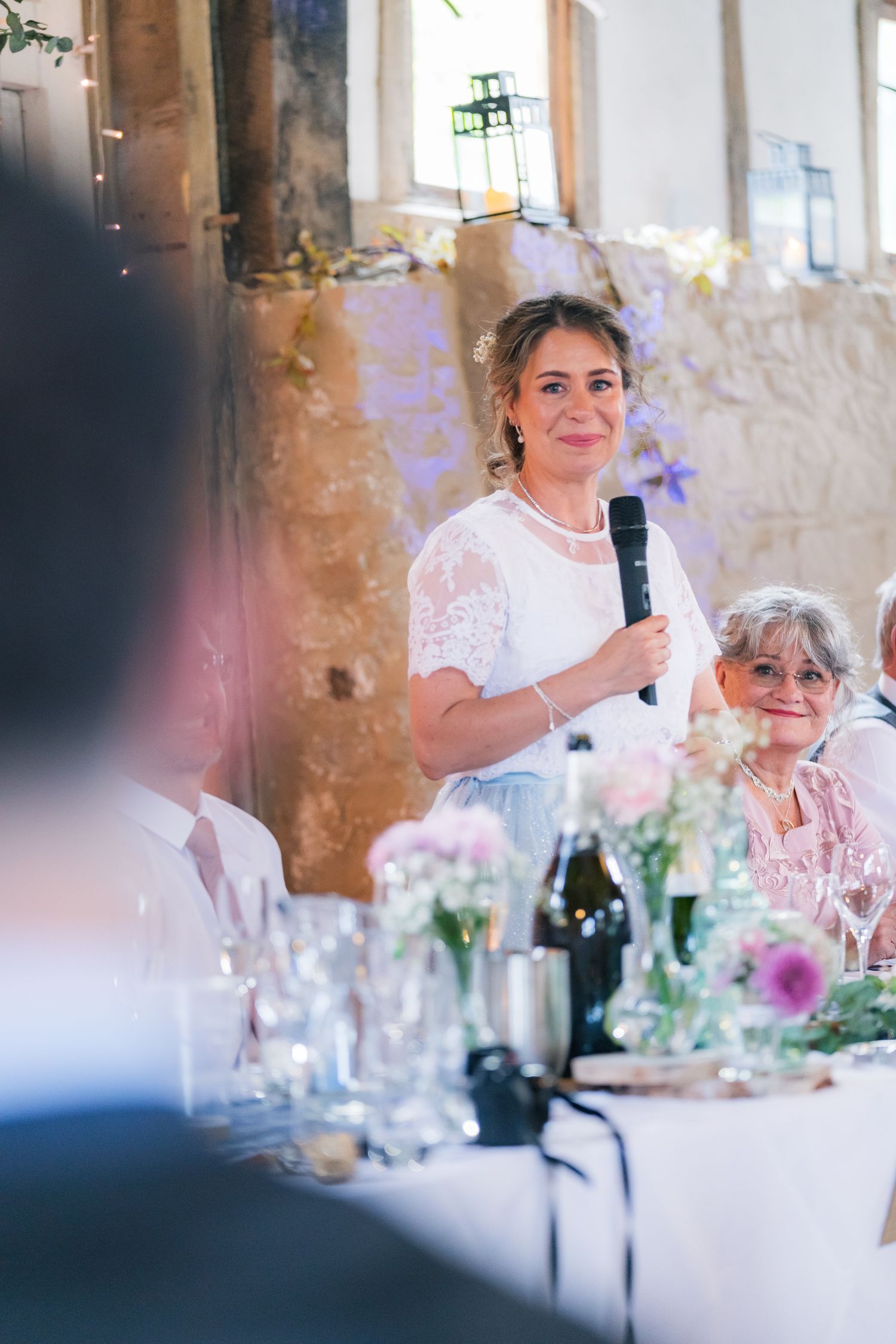 Heartfelt wedding speeches captured mid-reaction, full of laughter, tears, and candid emotion.