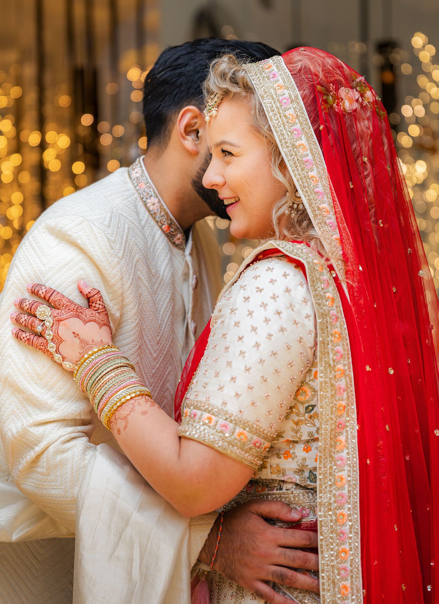 Natural couple portraits with relaxed posing and authentic emotion, taken in soft golden hour light.