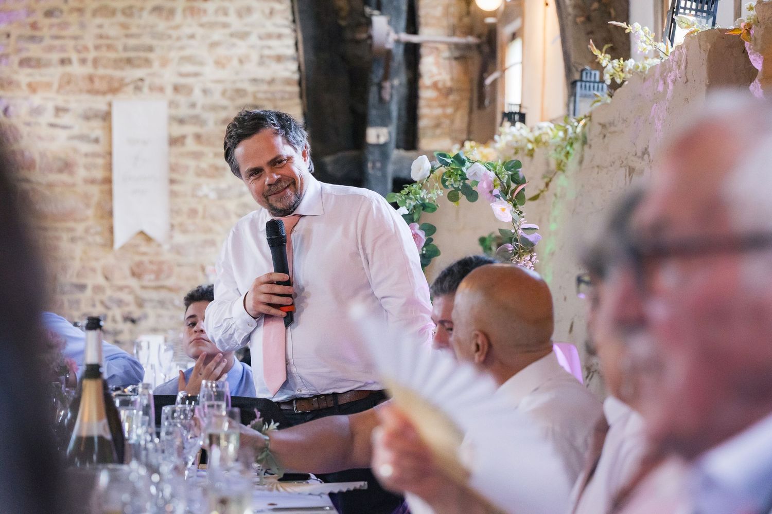 Heartfelt wedding speeches captured mid-reaction, full of laughter, tears, and candid emotion.