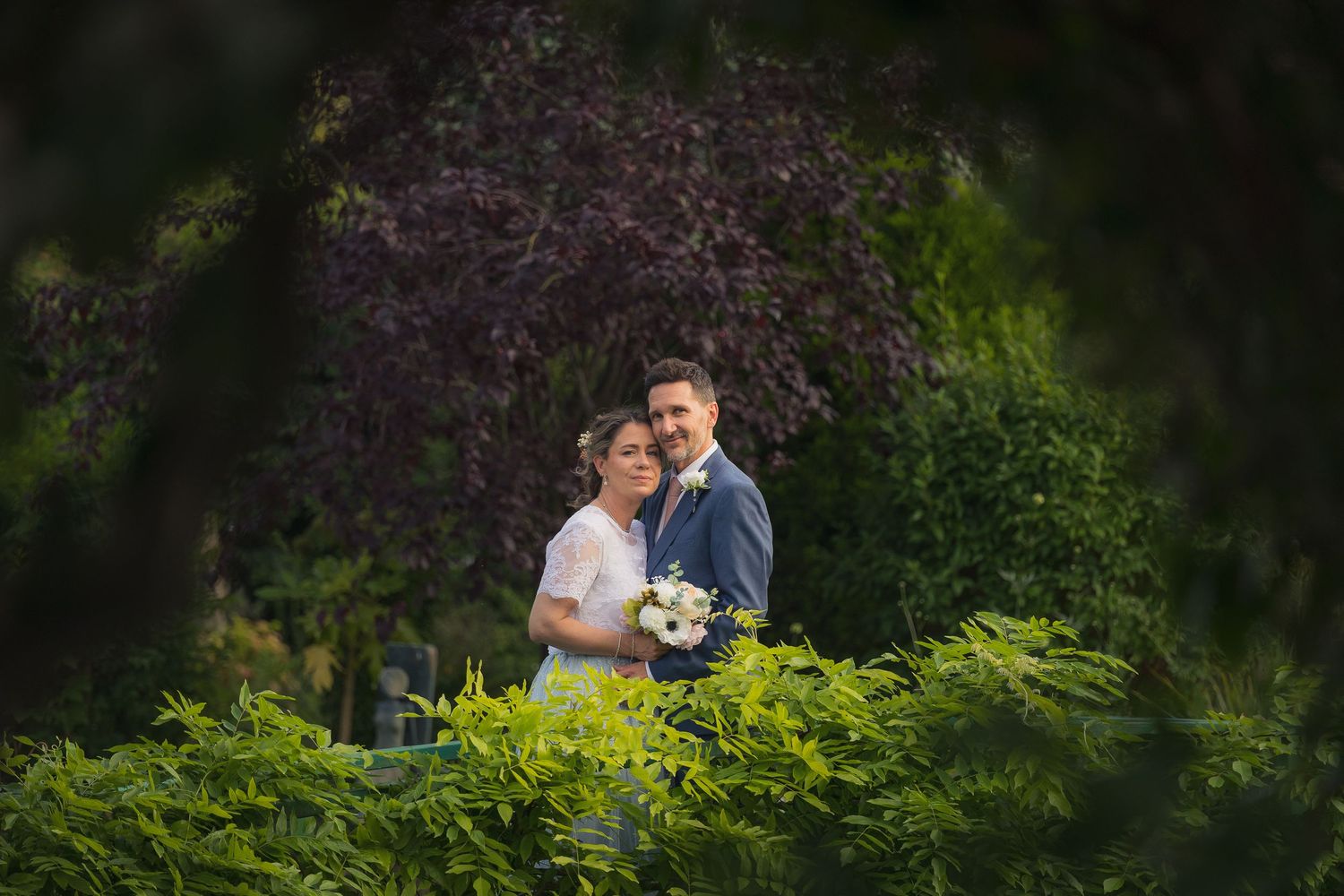 Natural couple portraits with relaxed posing and authentic emotion, taken in soft golden hour light.