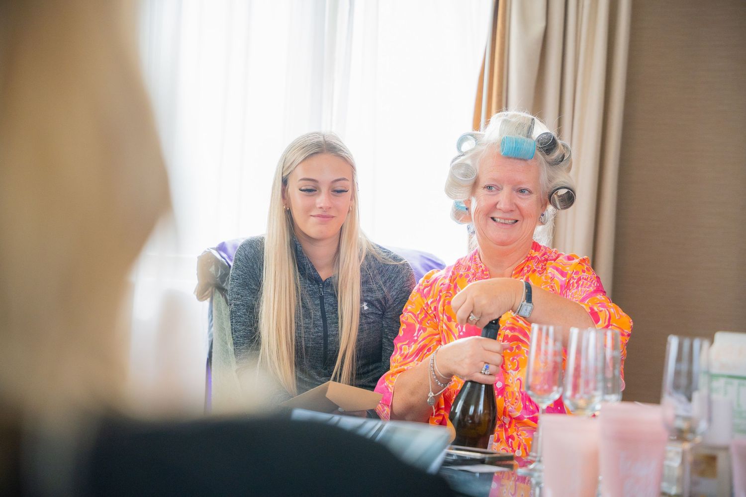 Candid bridal prep moments with soft light and emotion, captured naturally before the ceremony.