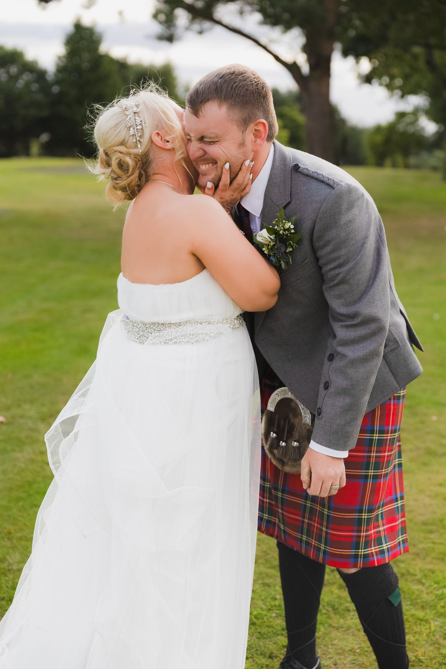 Natural couple portraits with relaxed posing and authentic emotion, taken in soft golden hour light.