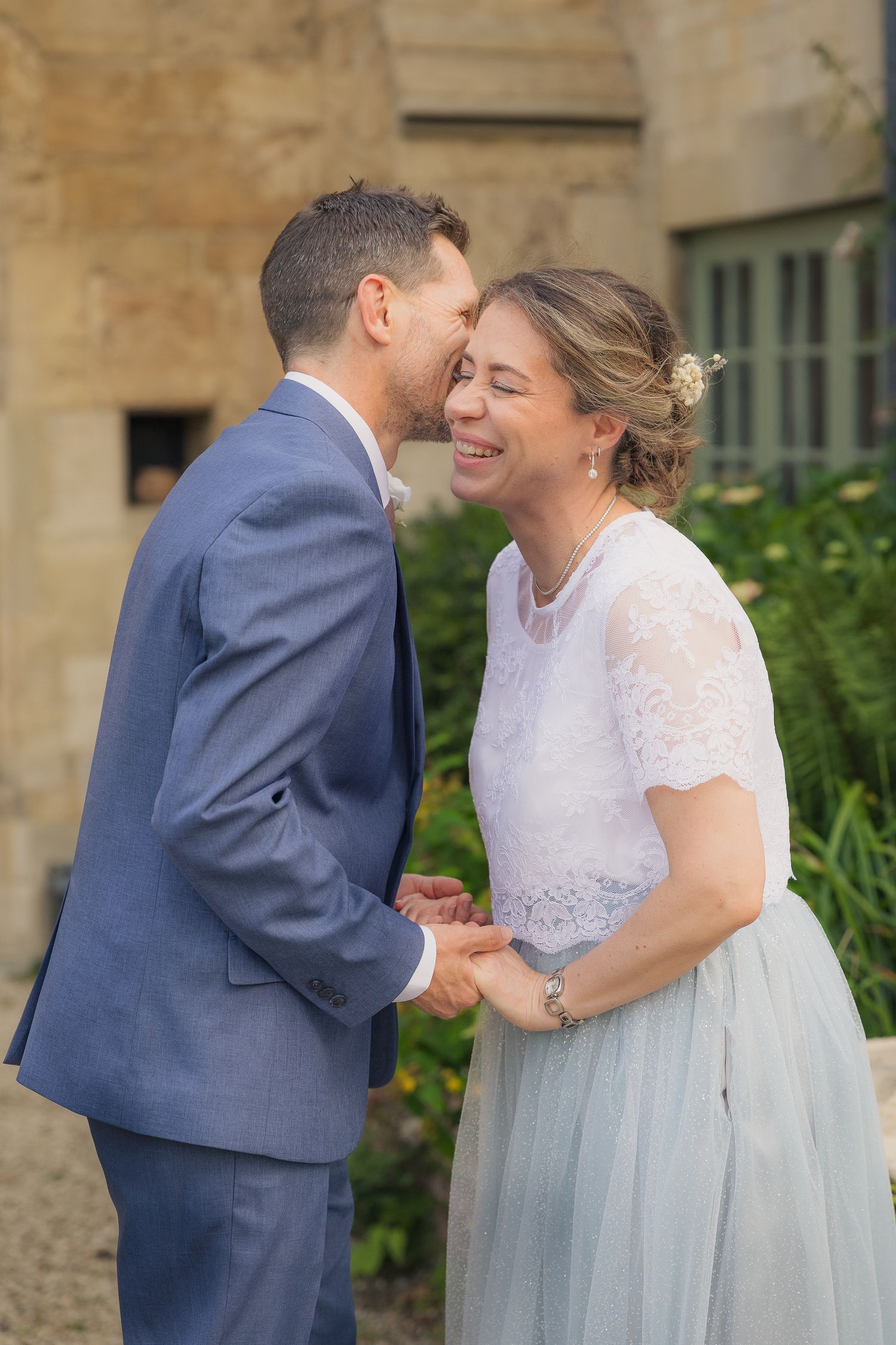 Natural couple portraits with relaxed posing and authentic emotion, taken in soft golden hour light.