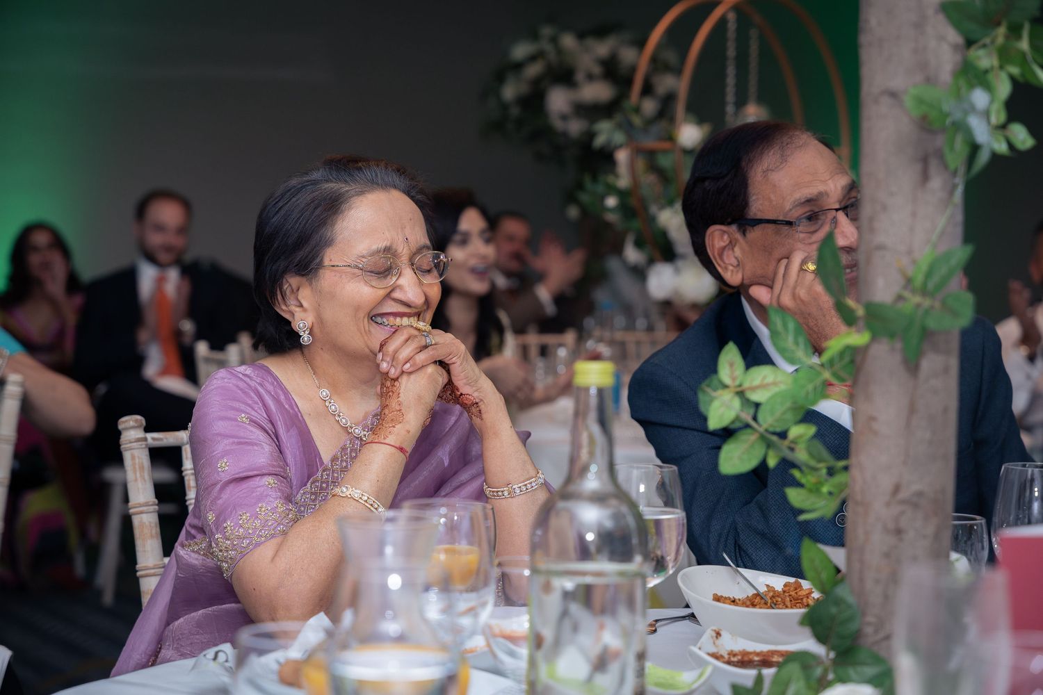 Heartfelt wedding speeches captured mid-reaction, full of laughter, tears, and candid emotion.