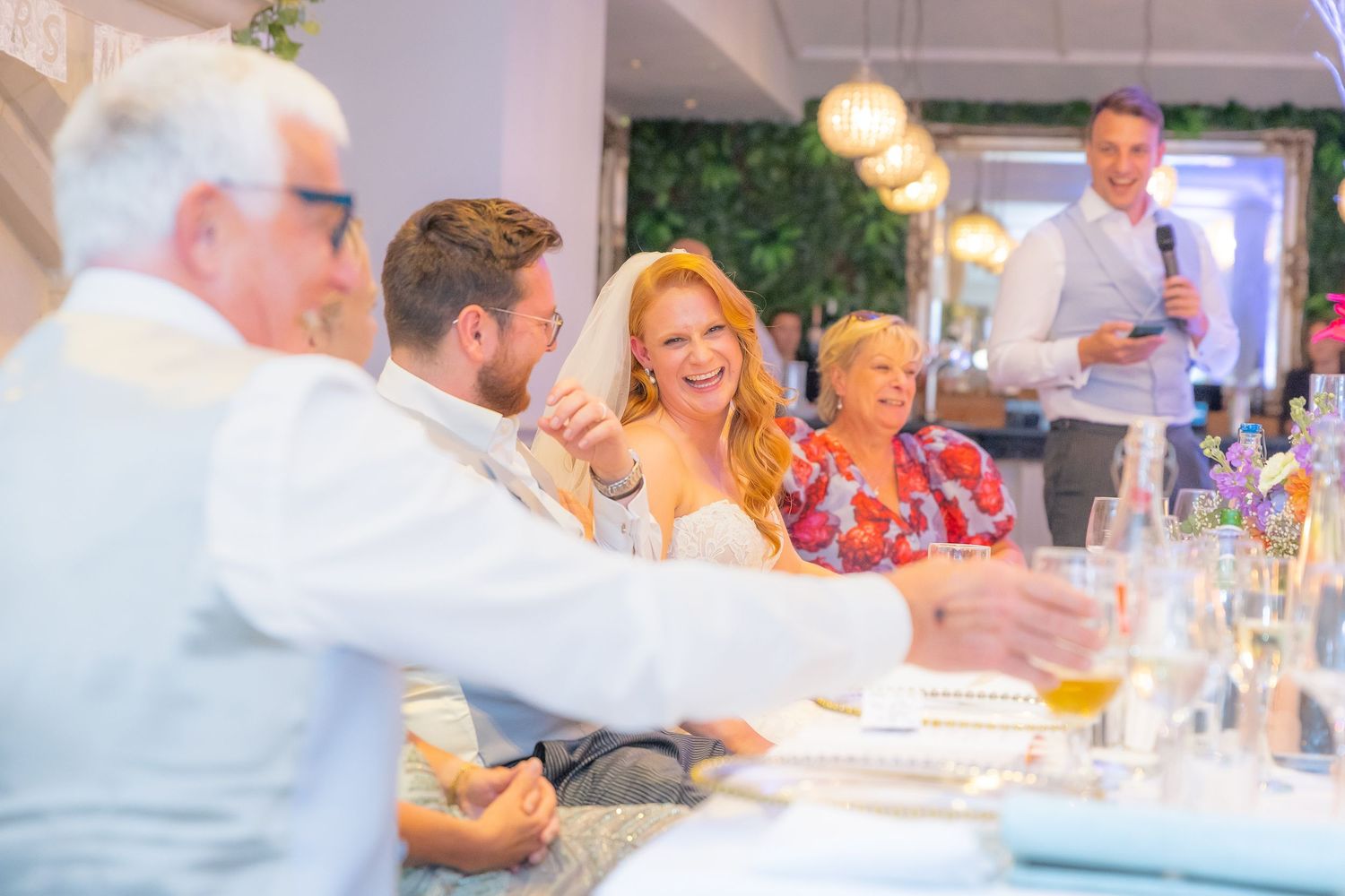 Heartfelt wedding speeches captured mid-reaction, full of laughter, tears, and candid emotion.