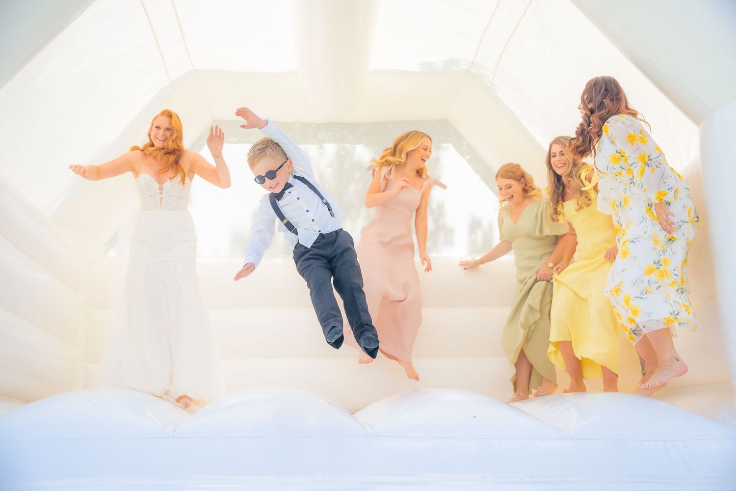 Candid shots of guests enjoying the wedding reception with laughter, toasts, and genuine moments.