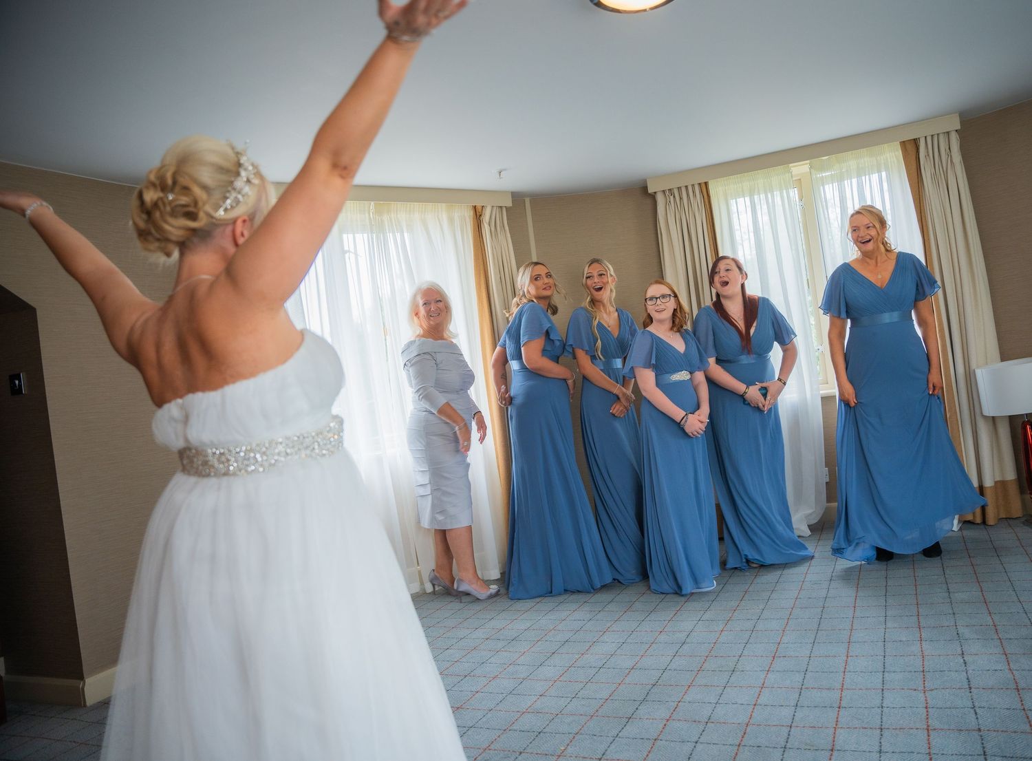 Candid bridal prep moments with soft light and emotion, captured naturally before the ceremony.