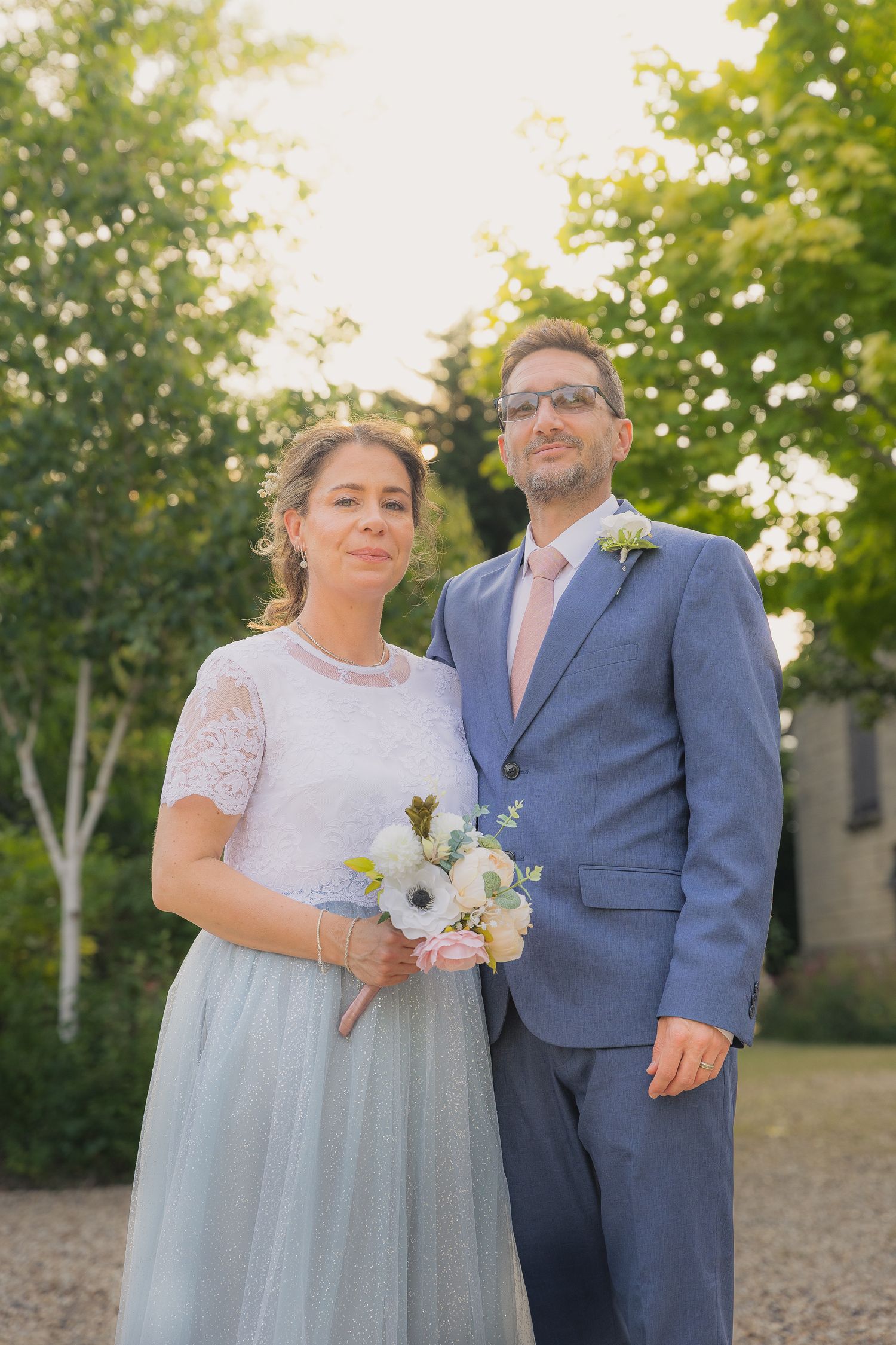 Natural couple portraits with relaxed posing and authentic emotion, taken in soft golden hour light.