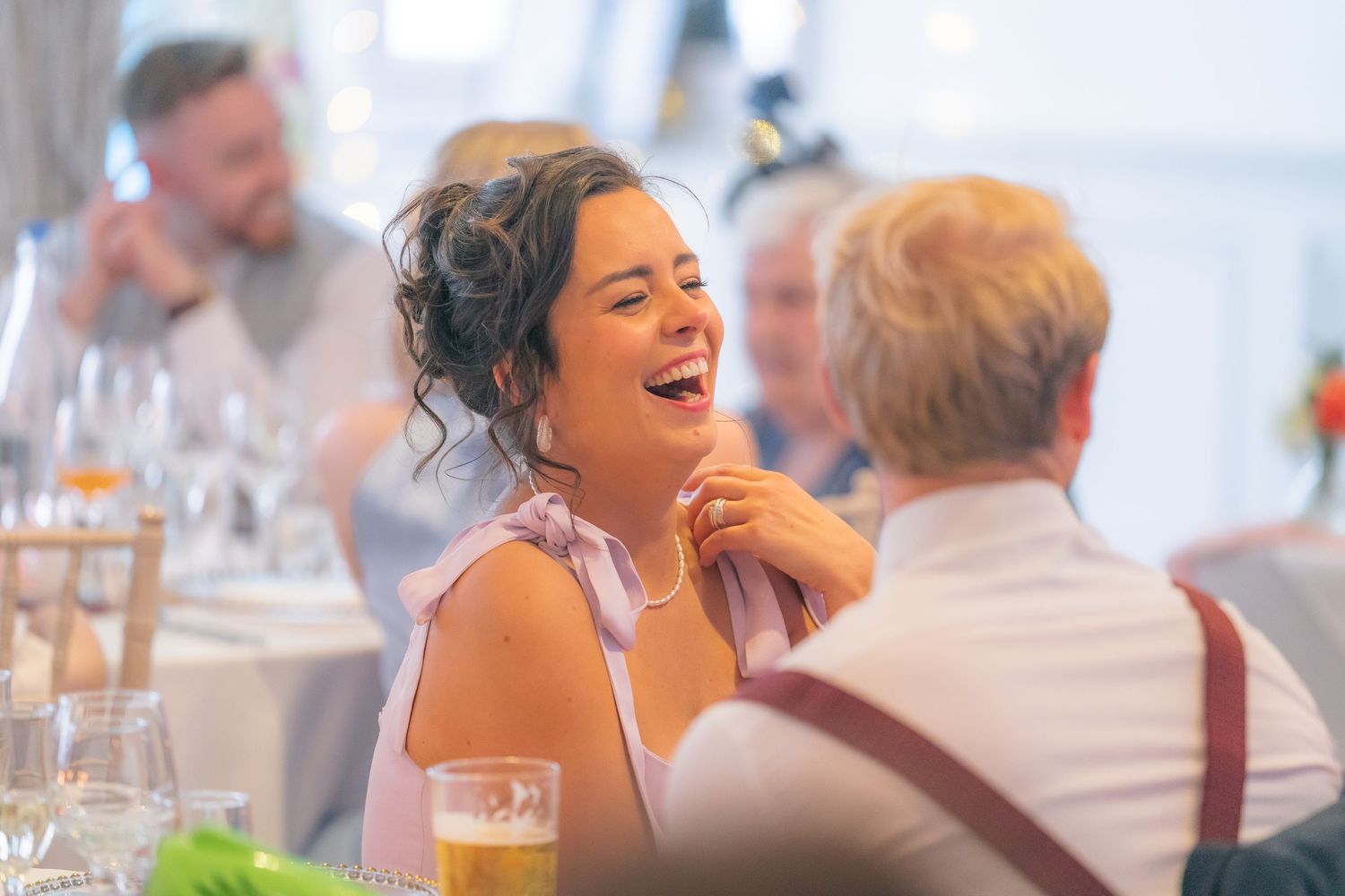 Heartfelt wedding speeches captured mid-reaction, full of laughter, tears, and candid emotion.