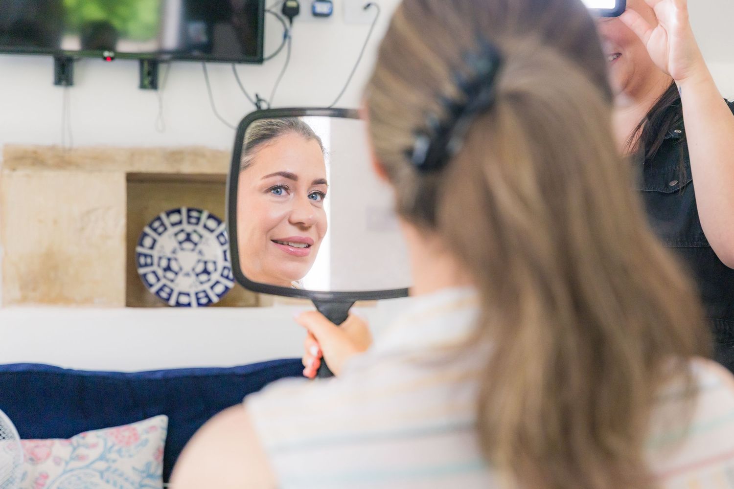 Candid bridal prep moments with soft light and emotion, captured naturally before the ceremony.