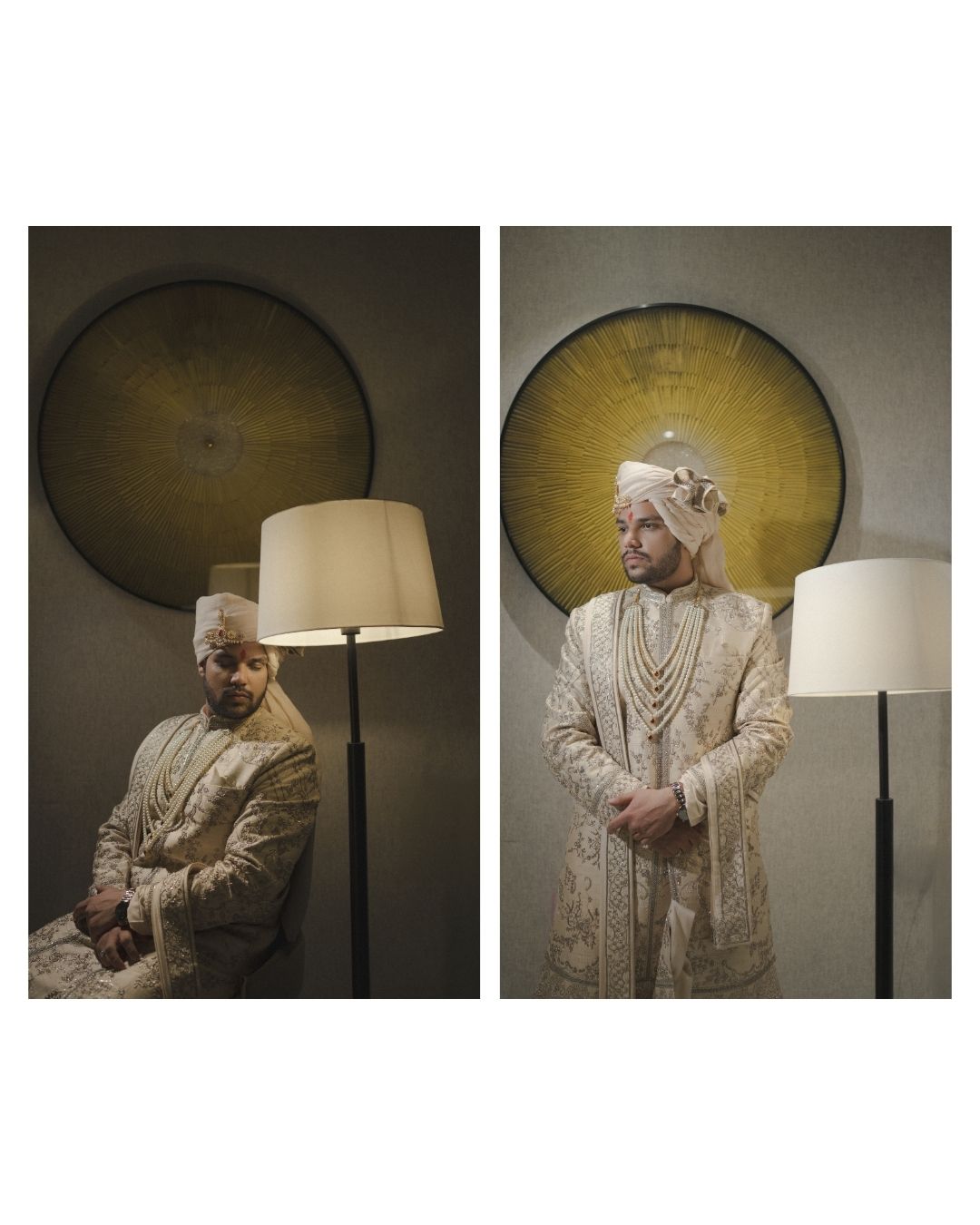 Man in traditional South Asian attire with embroidered sherwani and turban stands beside a floor lamp with decorative wall art.