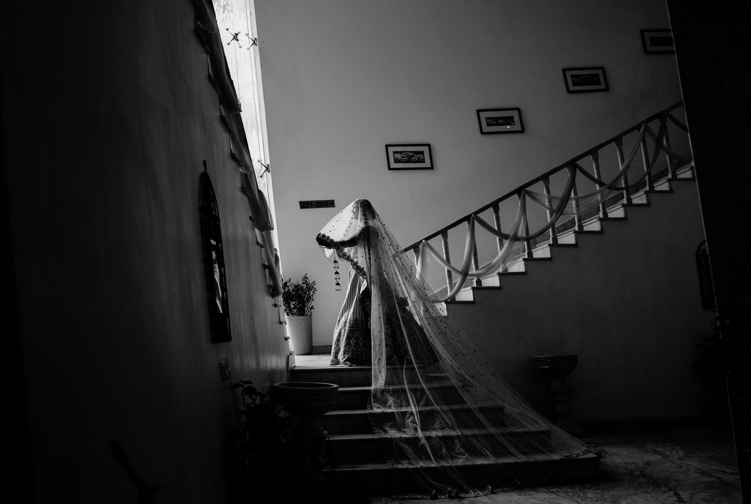 Dramatic black and white staircase photos with artistic lighting and architectural details.