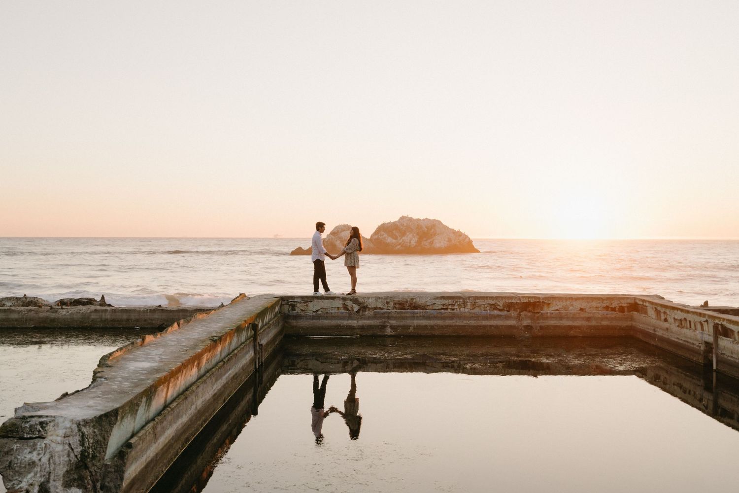 Beautiful coastal sunset landscape with cliffs and ocean views at golden hour.