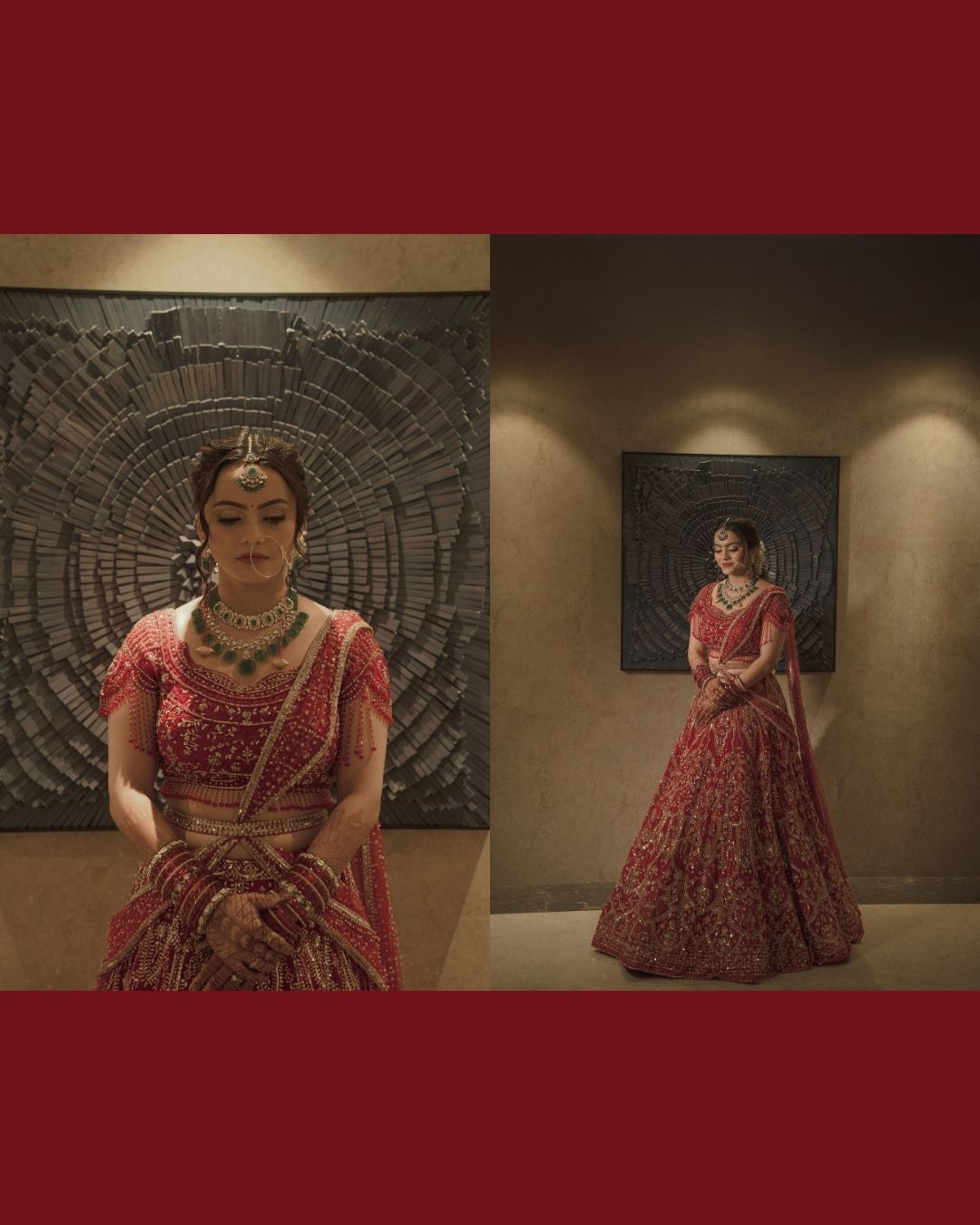 Bride in red embroidered lehenga with gold jewelry poses elegantly before dark sculptural wall art.