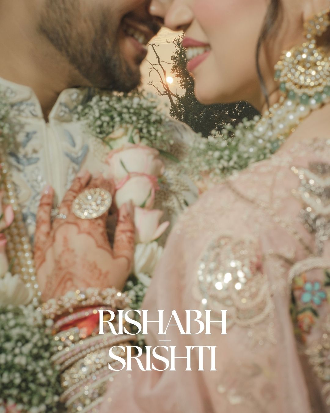 Rishabh and Srishti share an intimate moment in traditional Indian wedding attire with floral garlands and intricate jewelry.