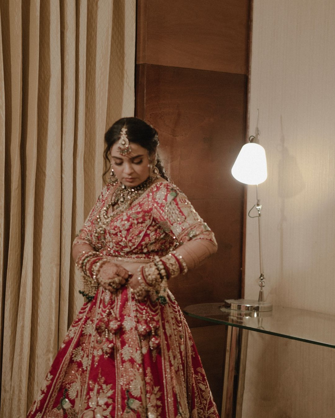 Bride Sanskriti in bridal lehenga — luxury wedding photography Delhi by Witty Shadows
