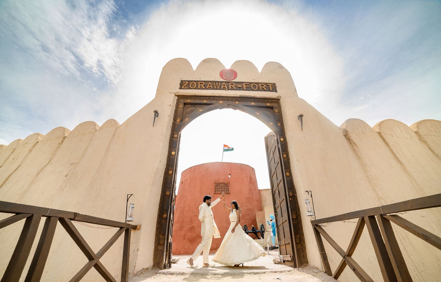 Stunning architectural details of a Tibetan monastery with white walls and decorative elements against a blue sky.