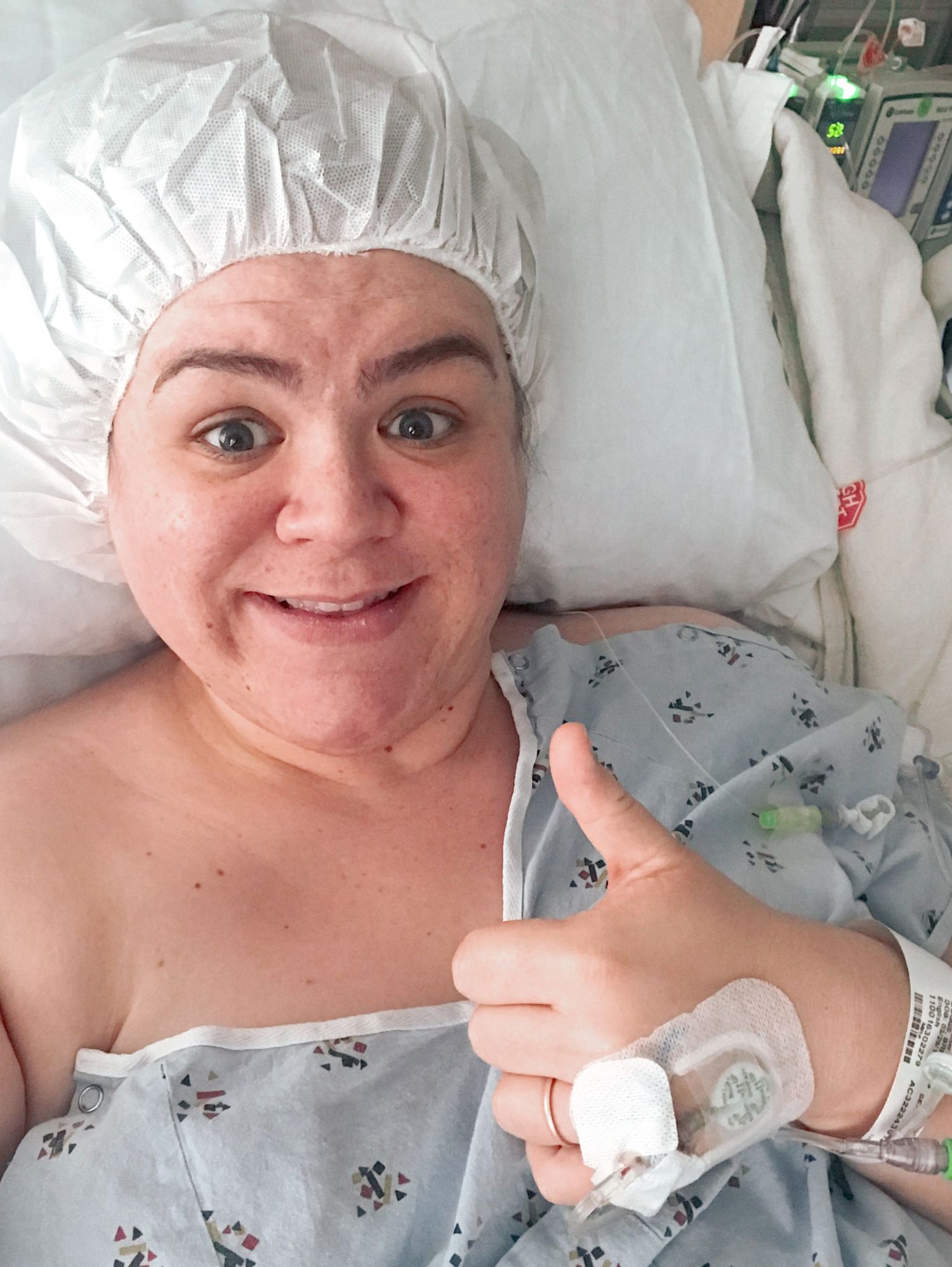 A series of four hospital bed selfies showing someone wearing a white hair cap giving a thumbs up and smiling.