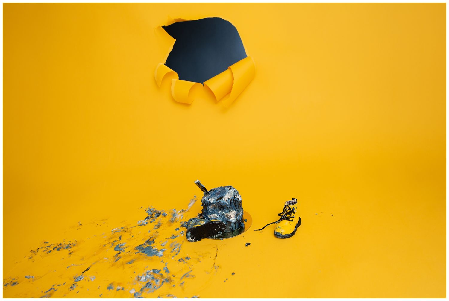 Graduation celebration scene with mortarboard and confetti against vibrant yellow background.