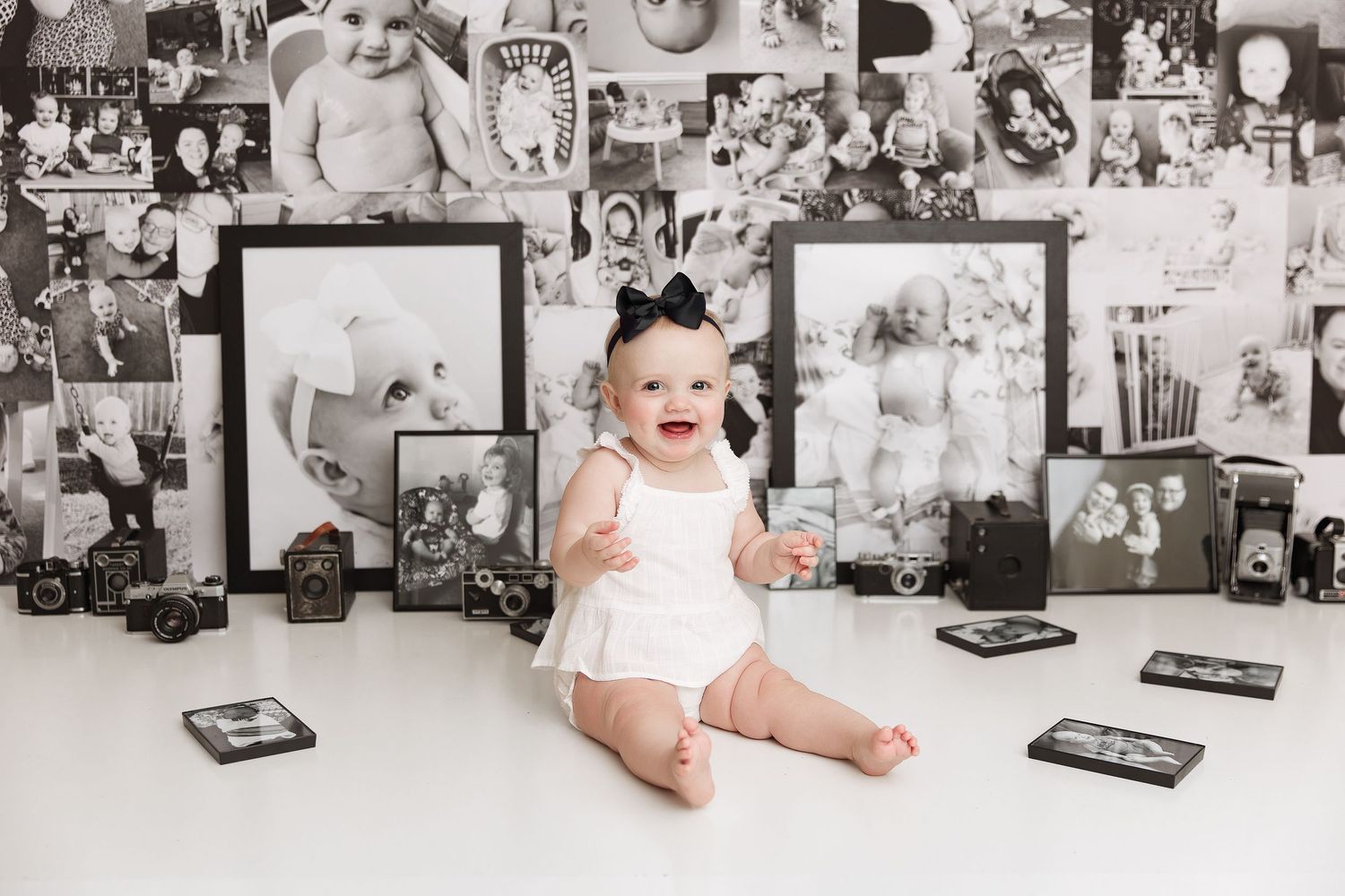 Black and white photo collage showing a baby milestone session with vintage props and decorations.