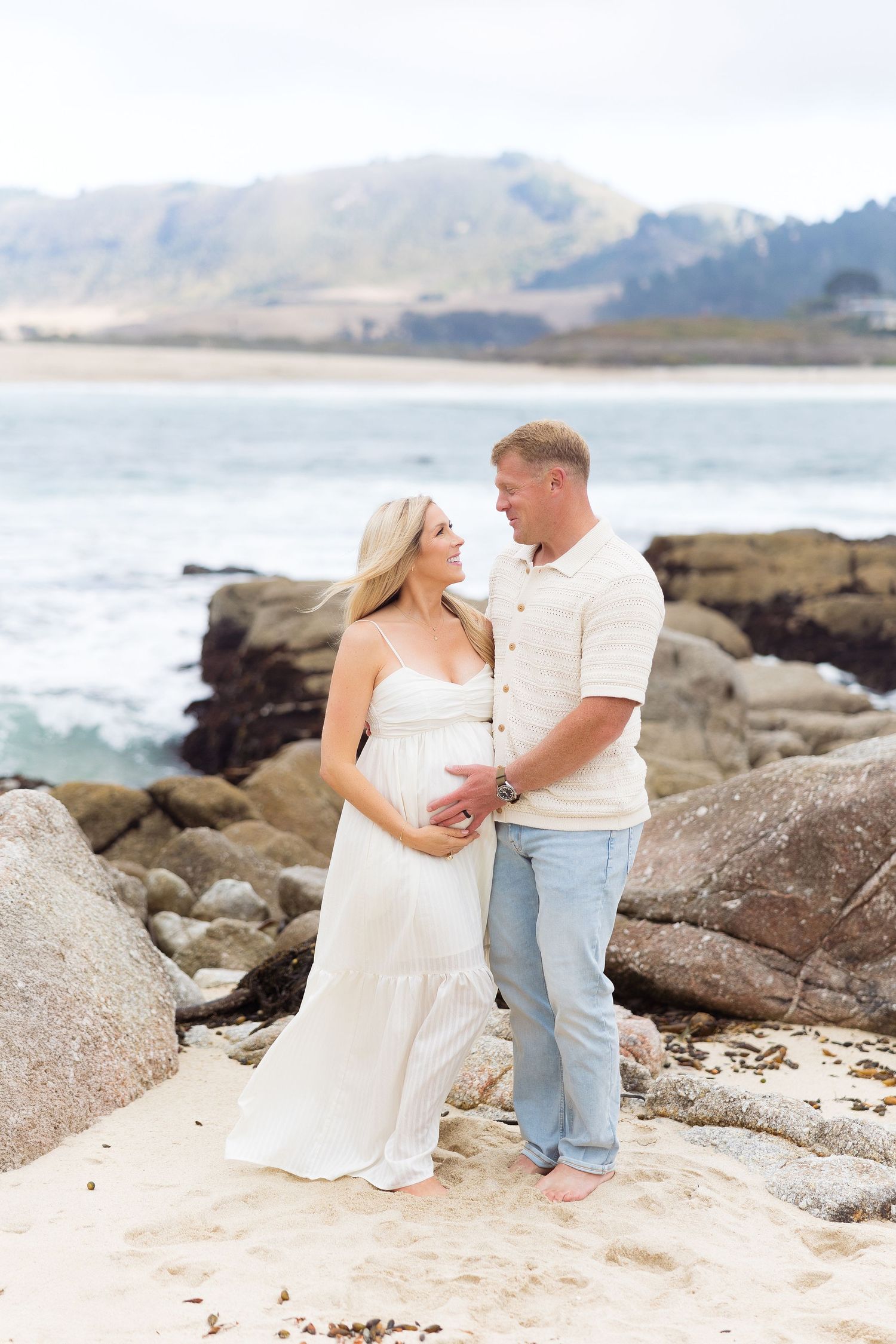 Maternity couple at Carmel Beach in white neutral clothing