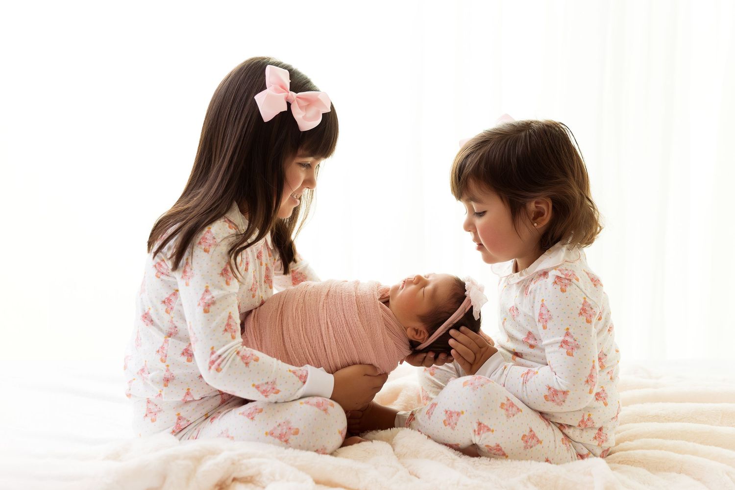 Family bonding moments in white floral pajamas.