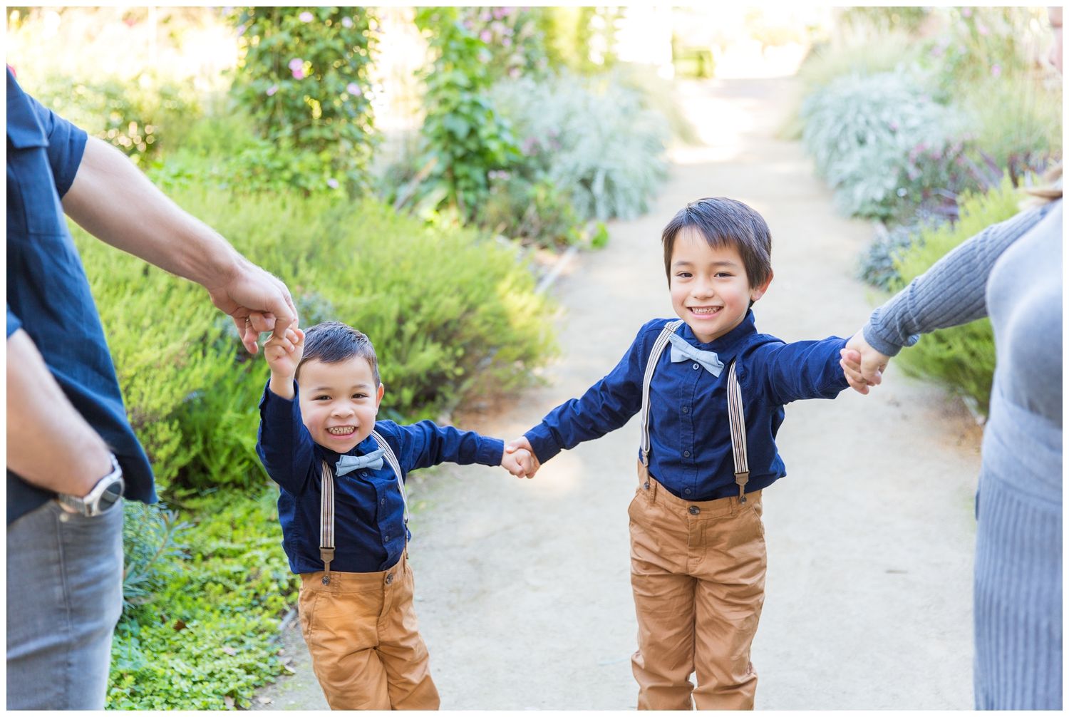 A series of candid outdoor family photos showing playful moments in a lush green garden setting.