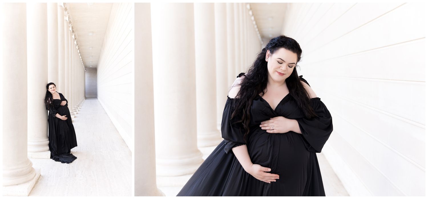 A person in black clothing poses against a white architectural background with columns.