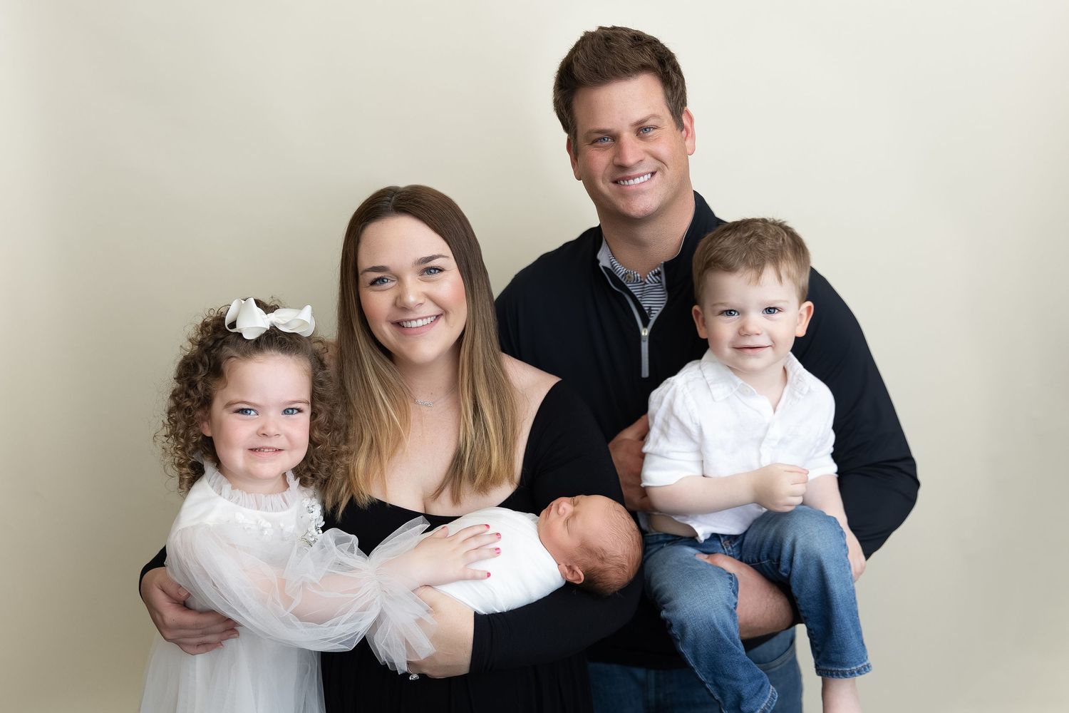 A series of casual family portraits against a neutral background showing parents and children in coordinated outfits.