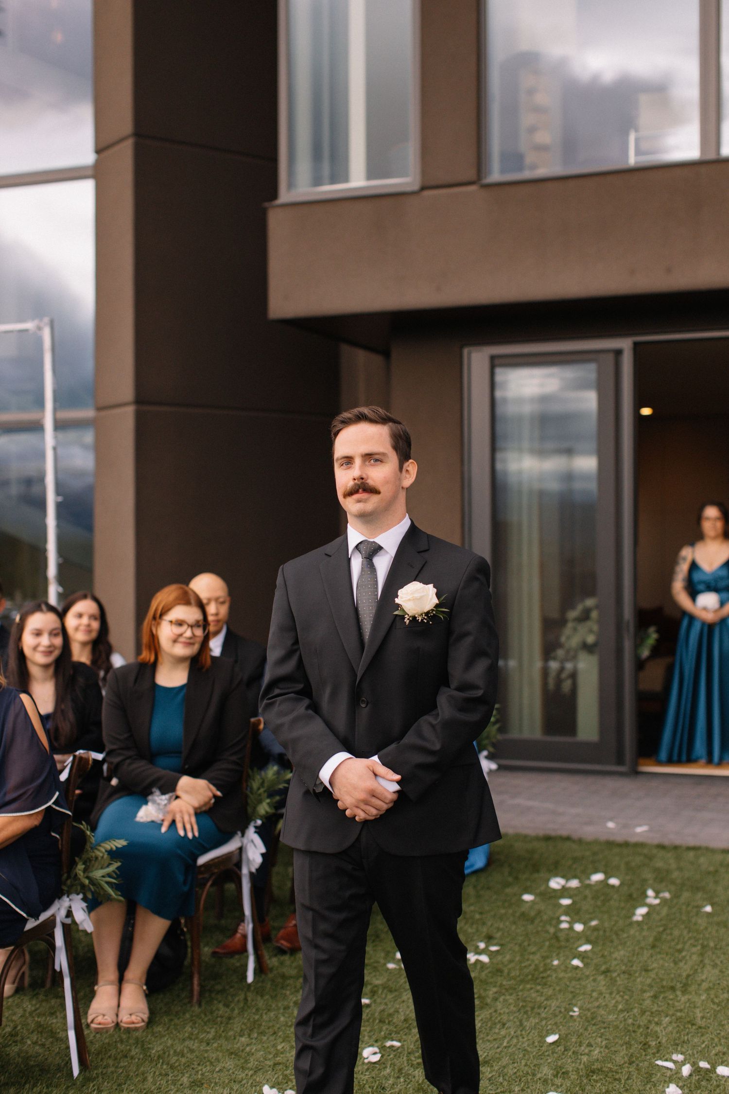 groom walking down the aisle