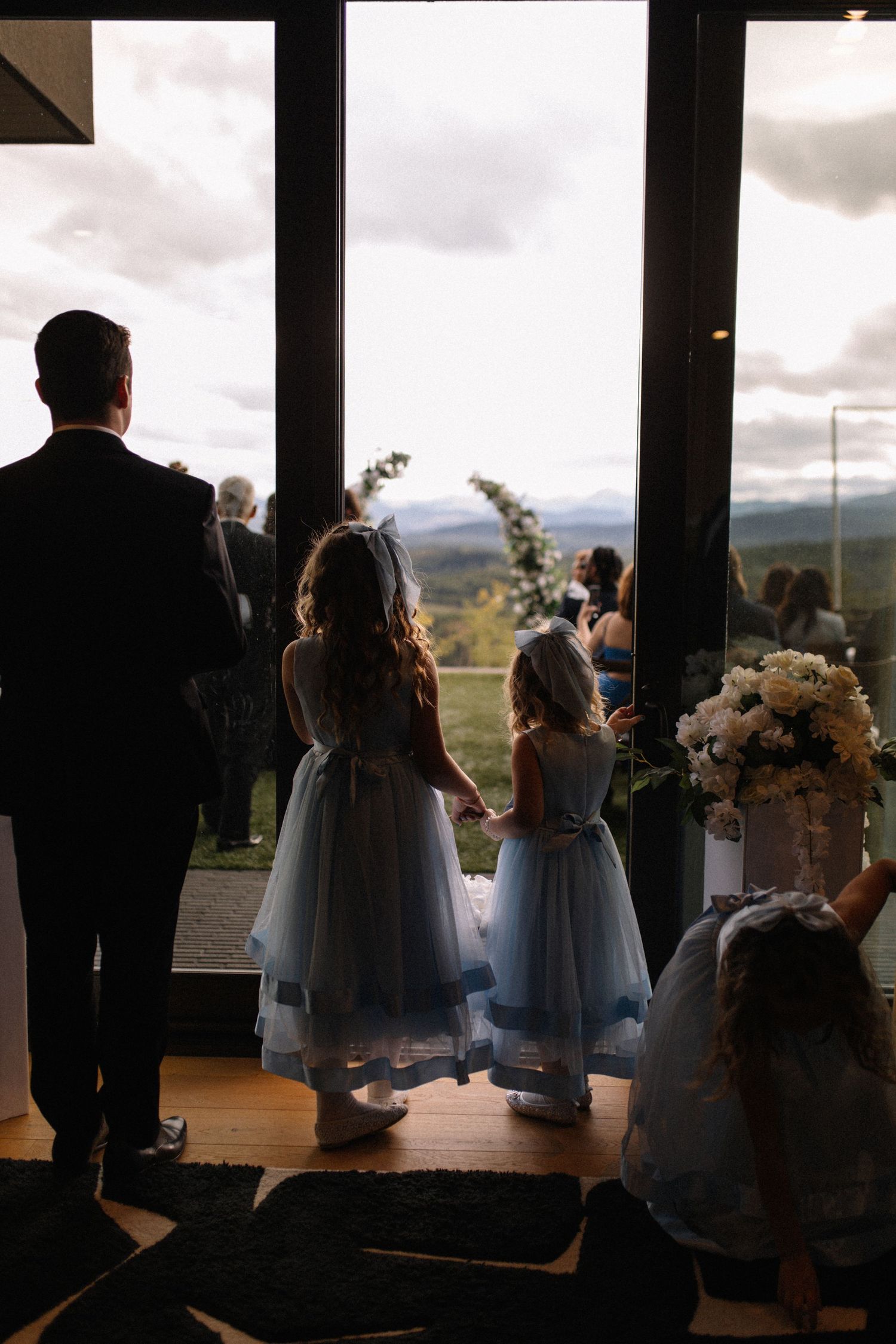 flower girls waiting to walk down the aisle