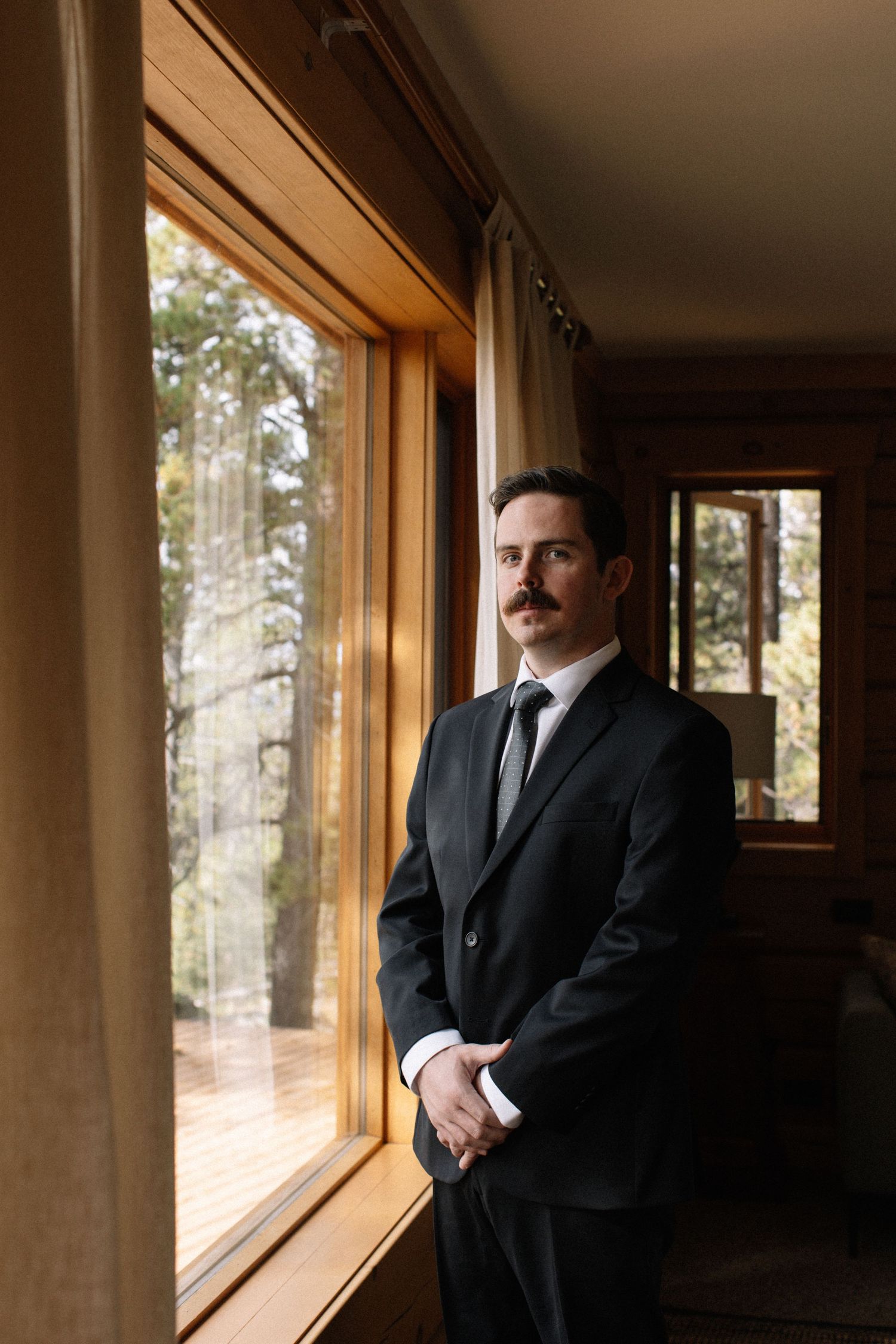 groom posing for portrait