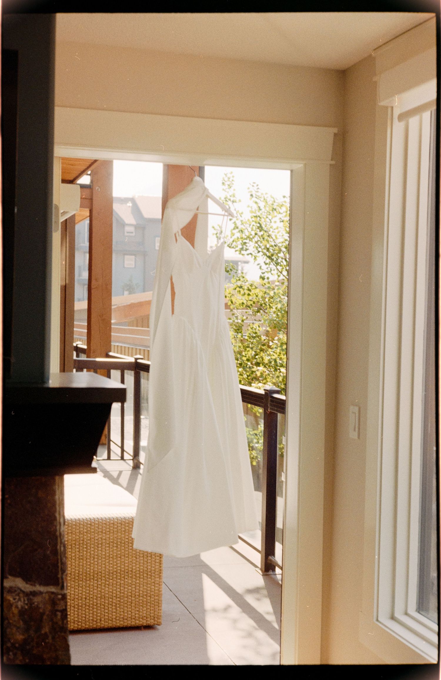 wedding dress hanging, film photo