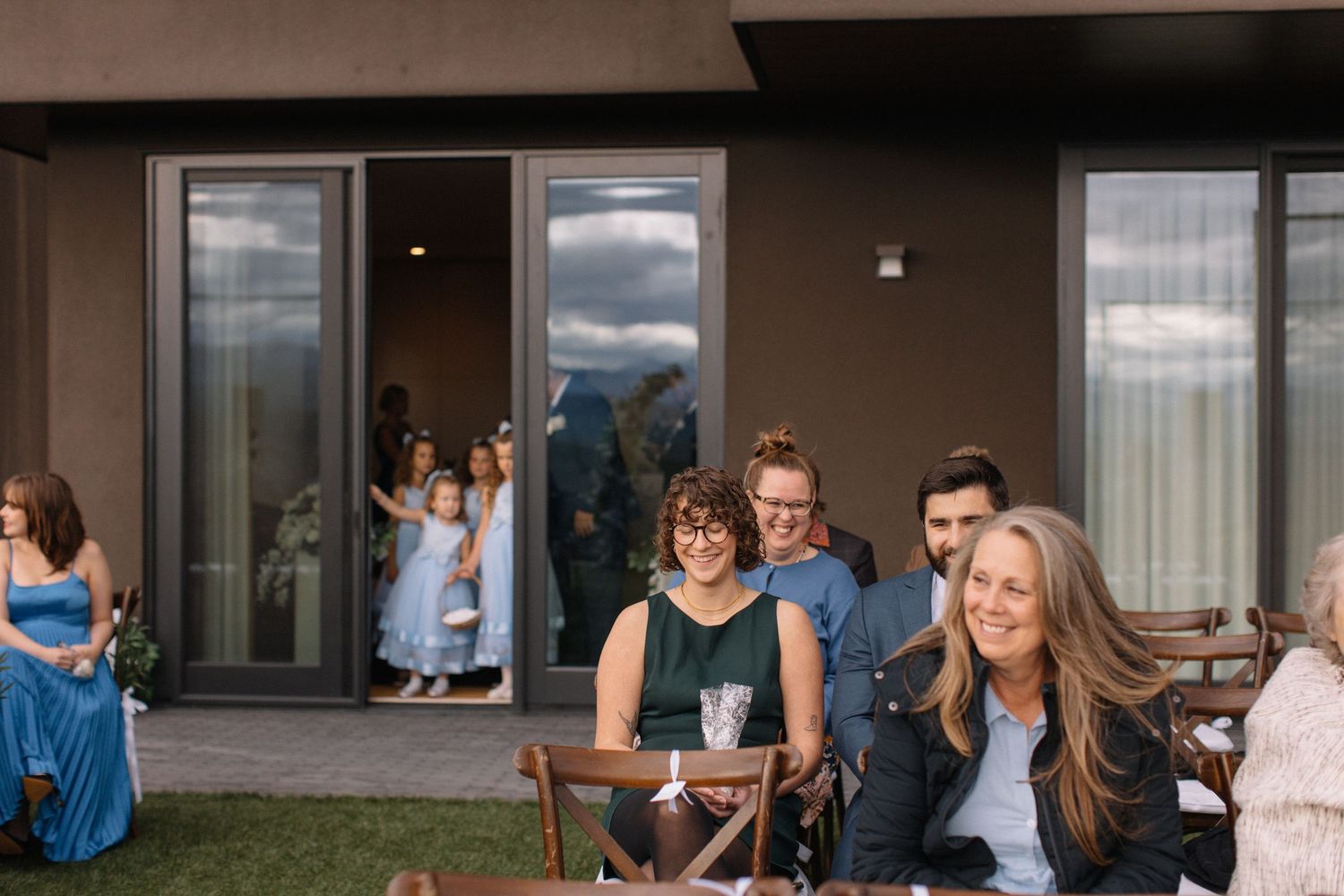 friends and family laughing before the ceremony