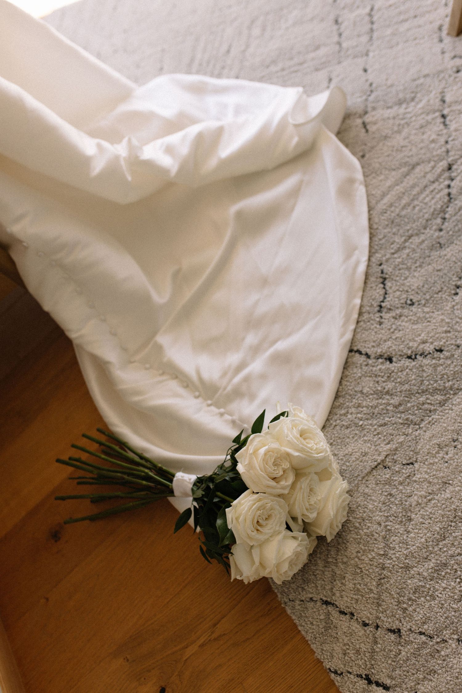 wedding dress and flower bouqeut