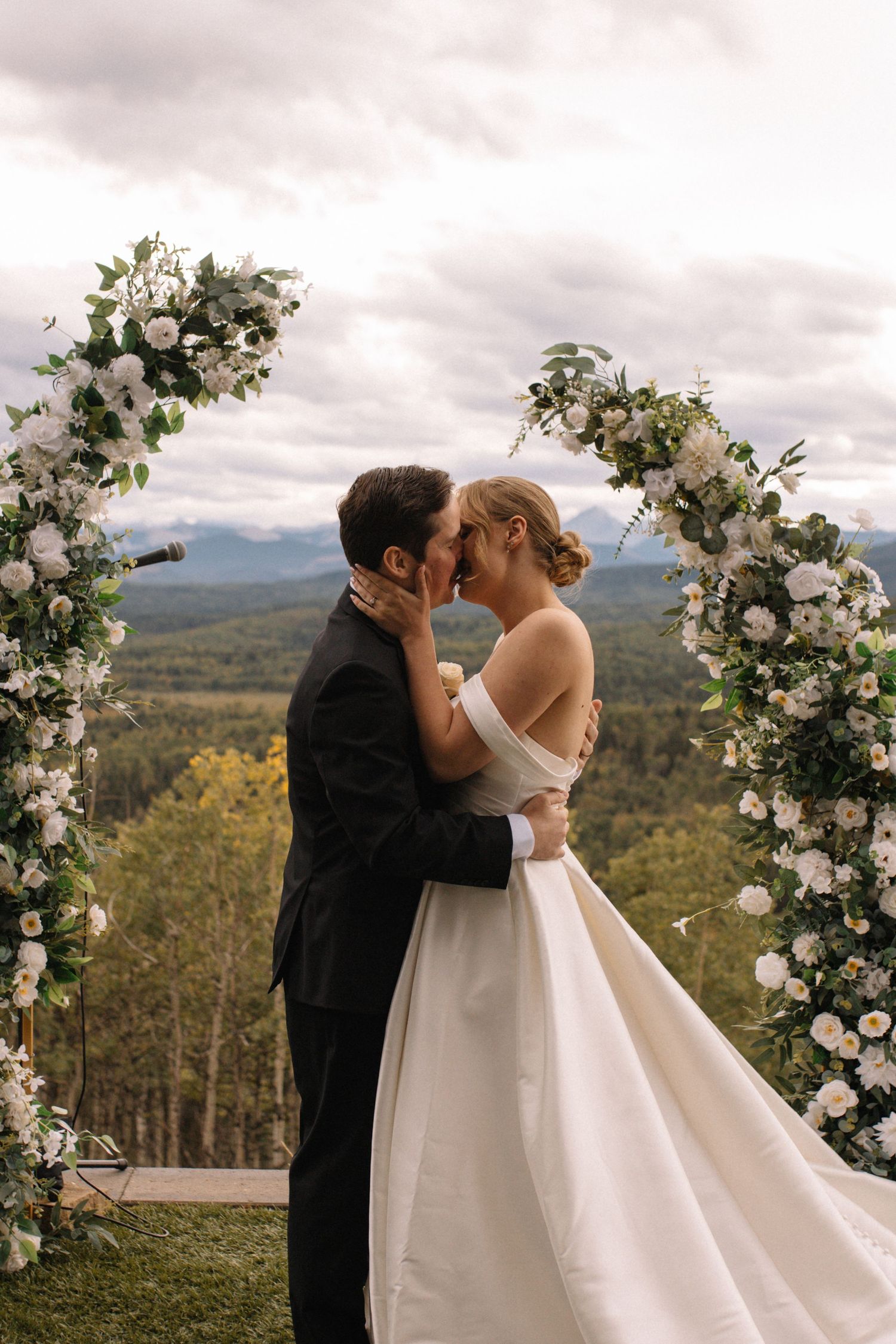 Bride and groom first kiss