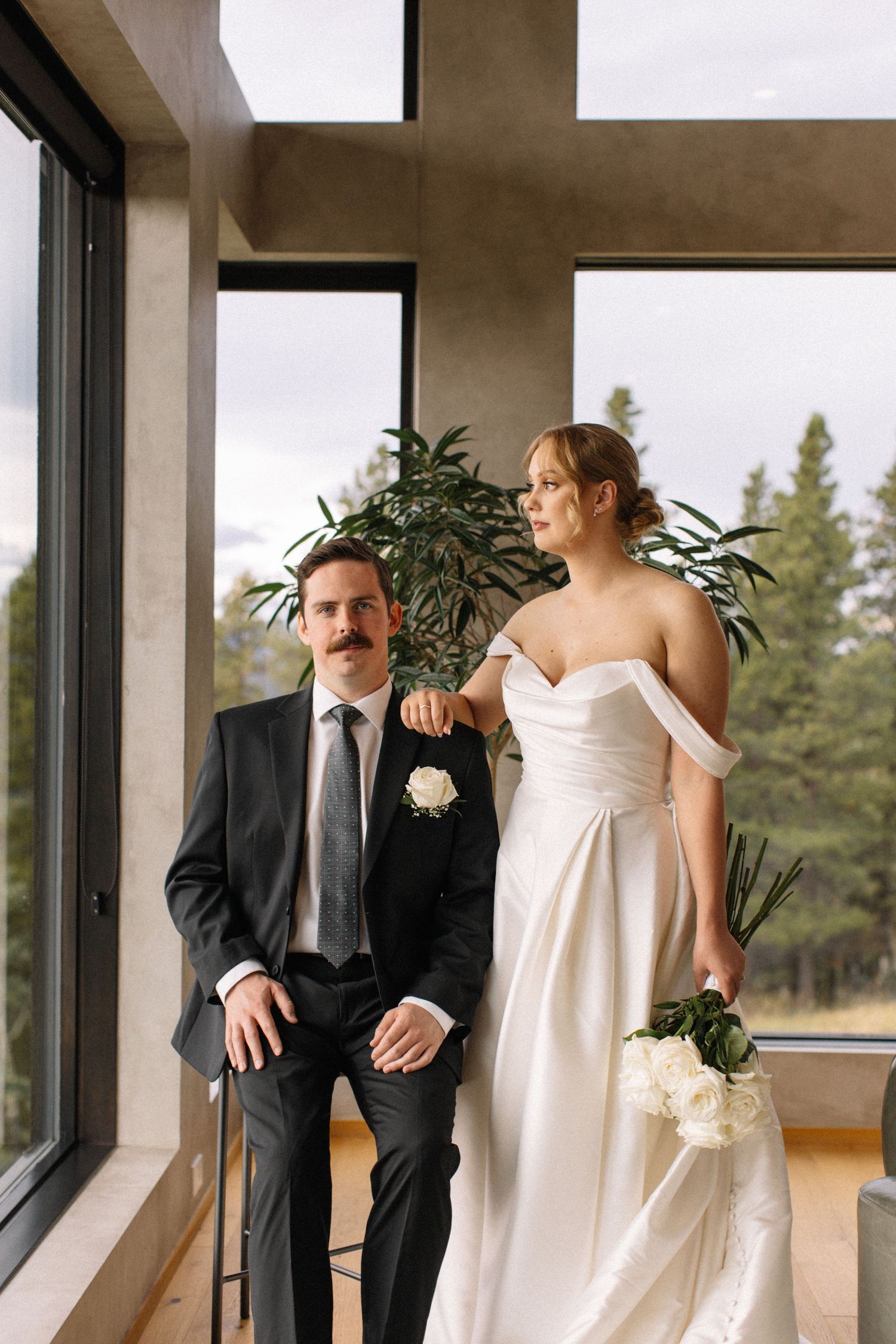 bride and groom posing for portrait