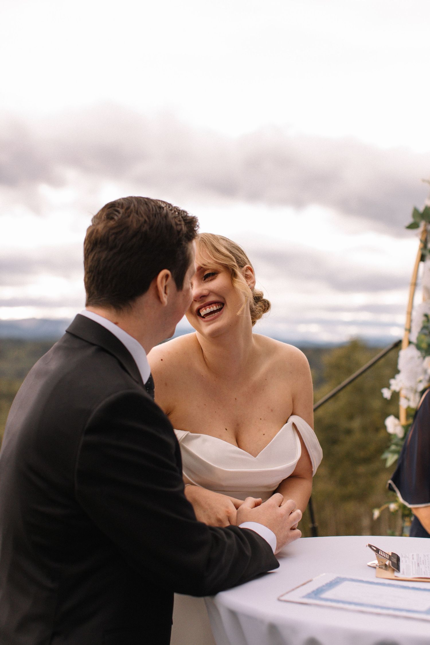 Bride and groom signing marriage license