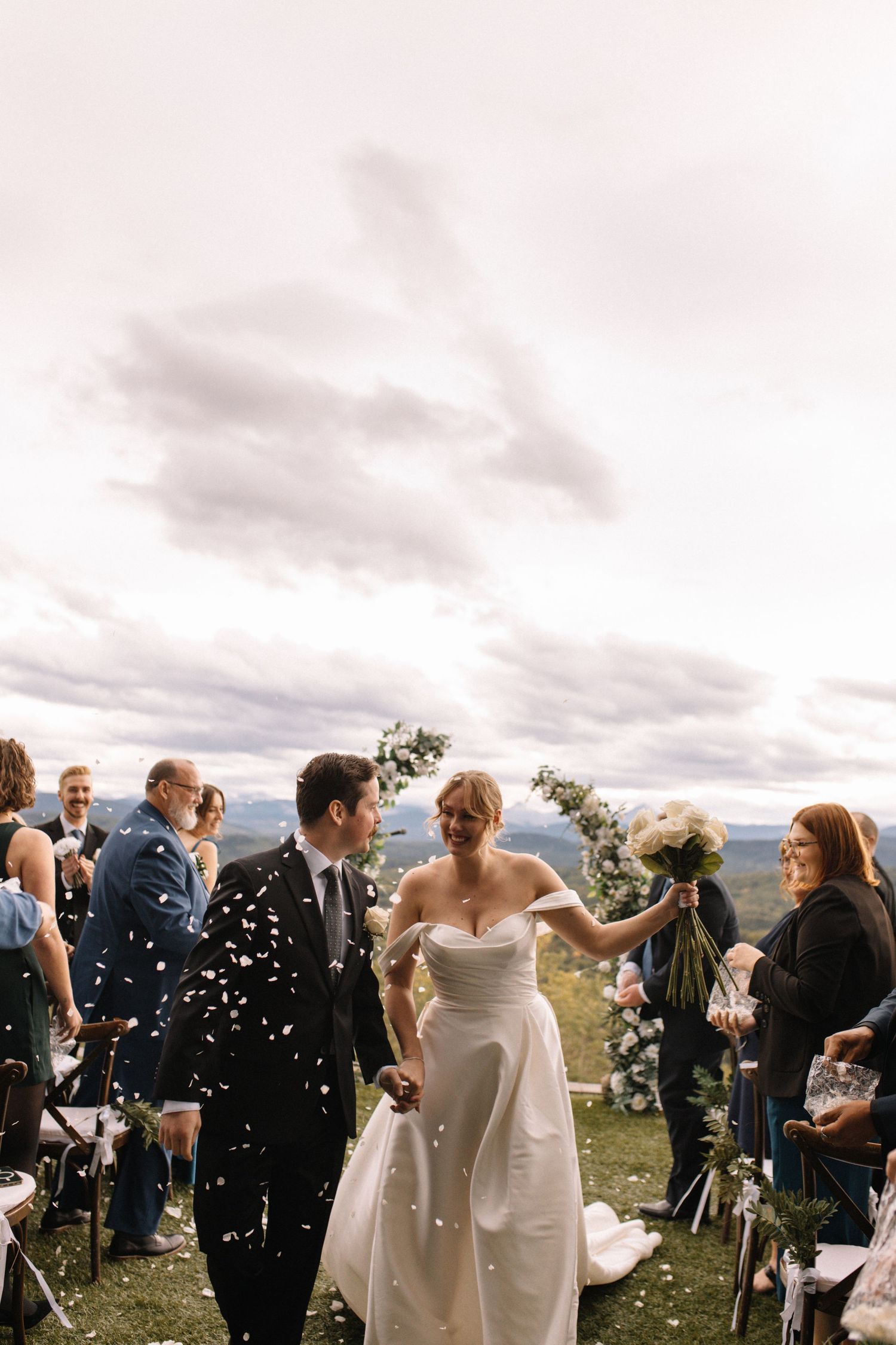 Bride and groom walking down the aisle
