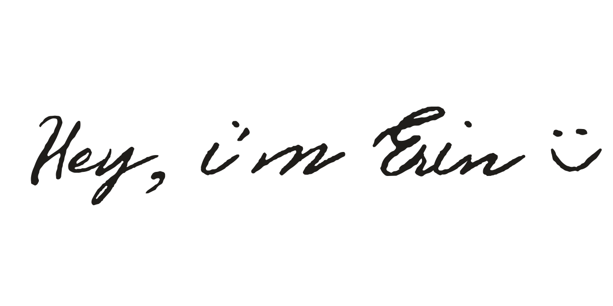 Handwritten text on white paper saying 'Hey I'm Erin'.